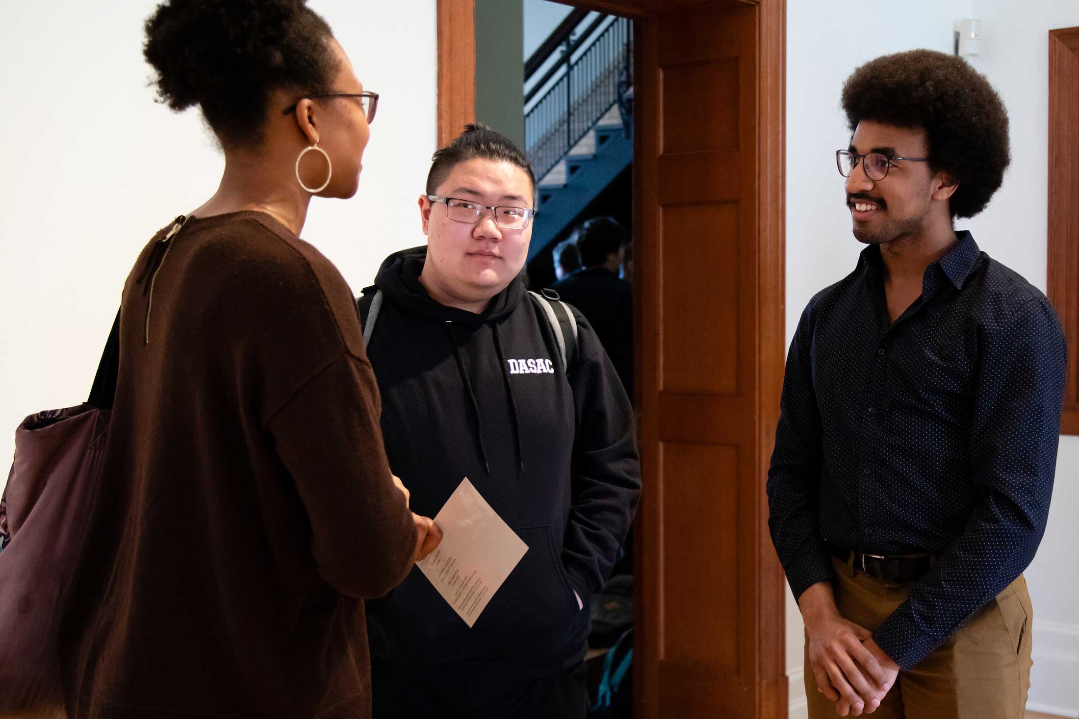 Jonathan Jackson ’19 (right) at the reception for 3 graduating artists
