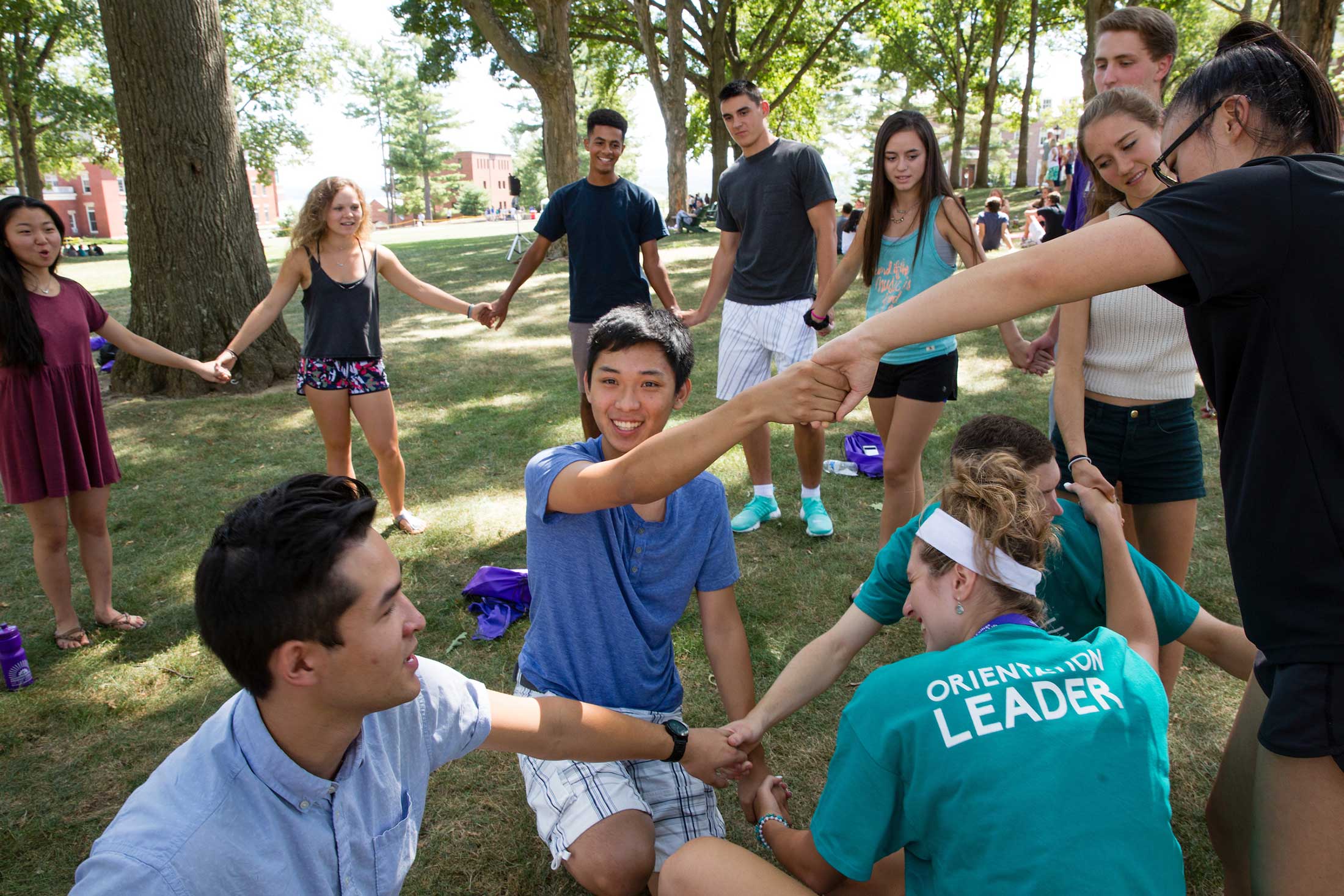 Students participating in an ice-breaker activity during orientation