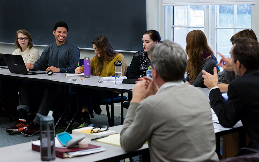 Students participate in a conversation during a class