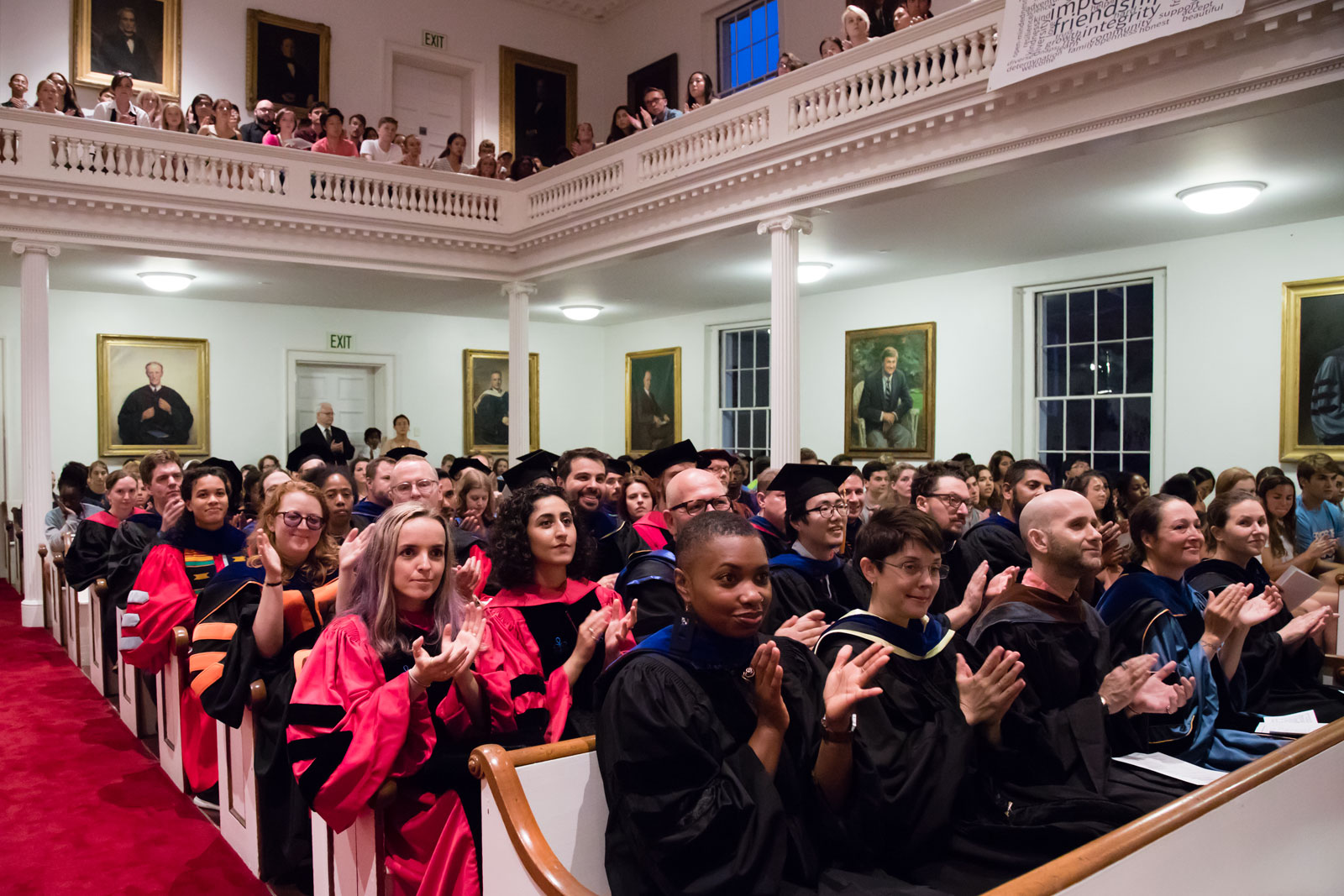 Faculty and students seated in the audience in Johnson Chapel