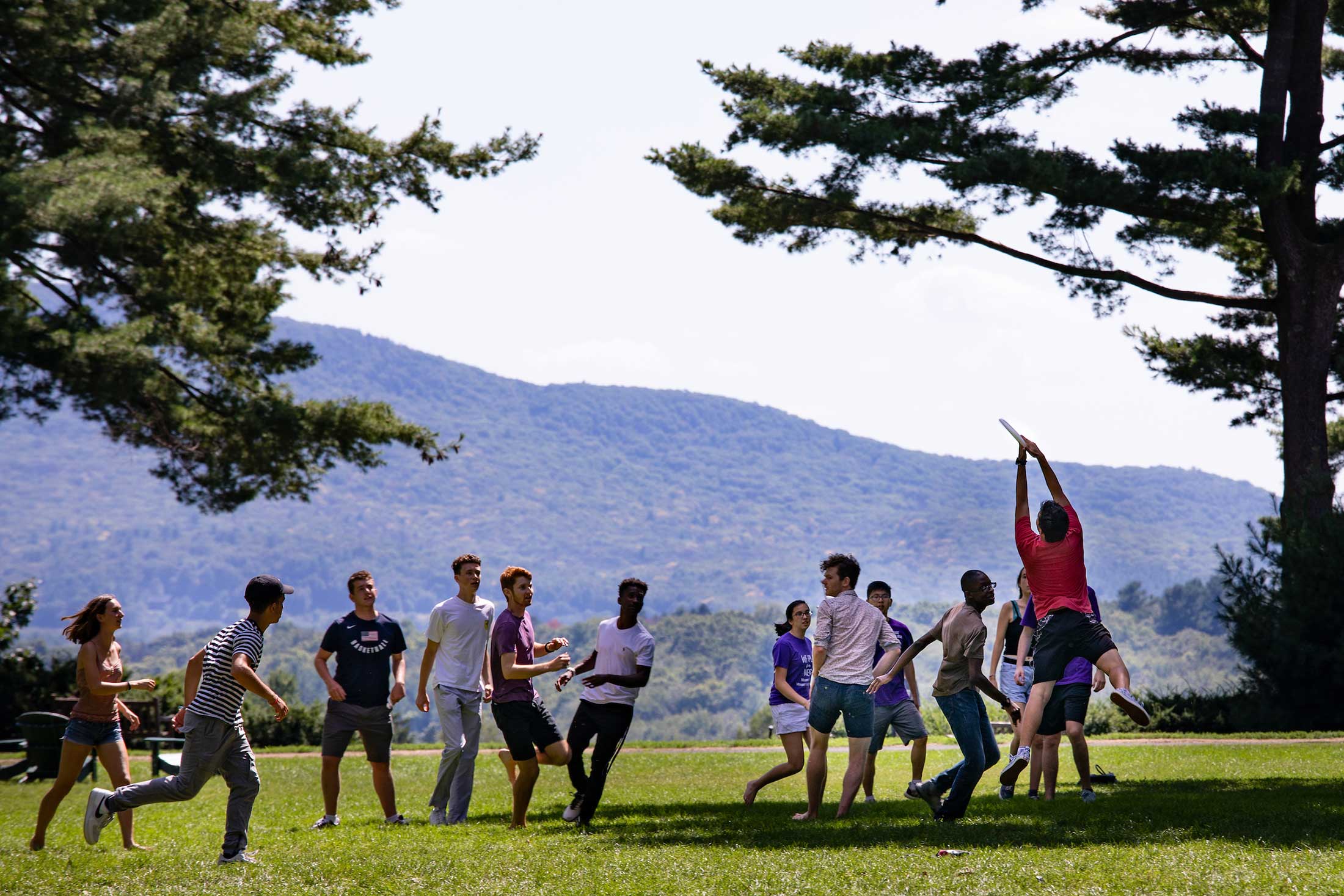 Students playing frisbee on the Academic quad