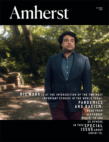 Magazine cover showing a man in a suit standing on a pathway outside looking off into the distance.