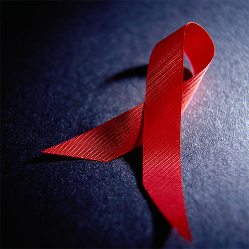 A red AIDS ribbon