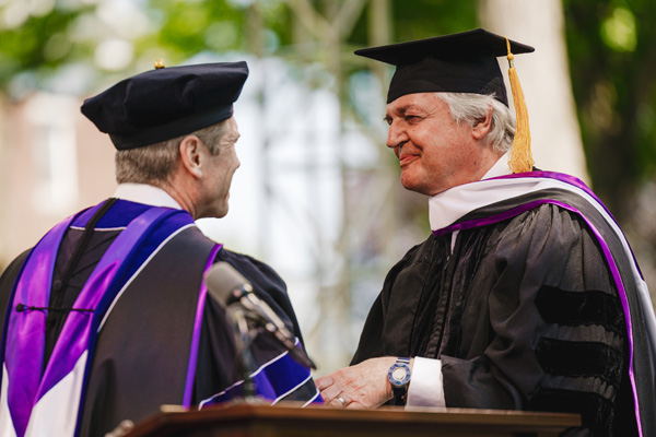 President Elliott presents and honorary degree to Paul Polman