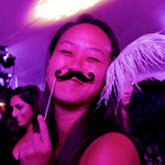 A member of the Class of 2016 sports a costume mustache at Senior Ball